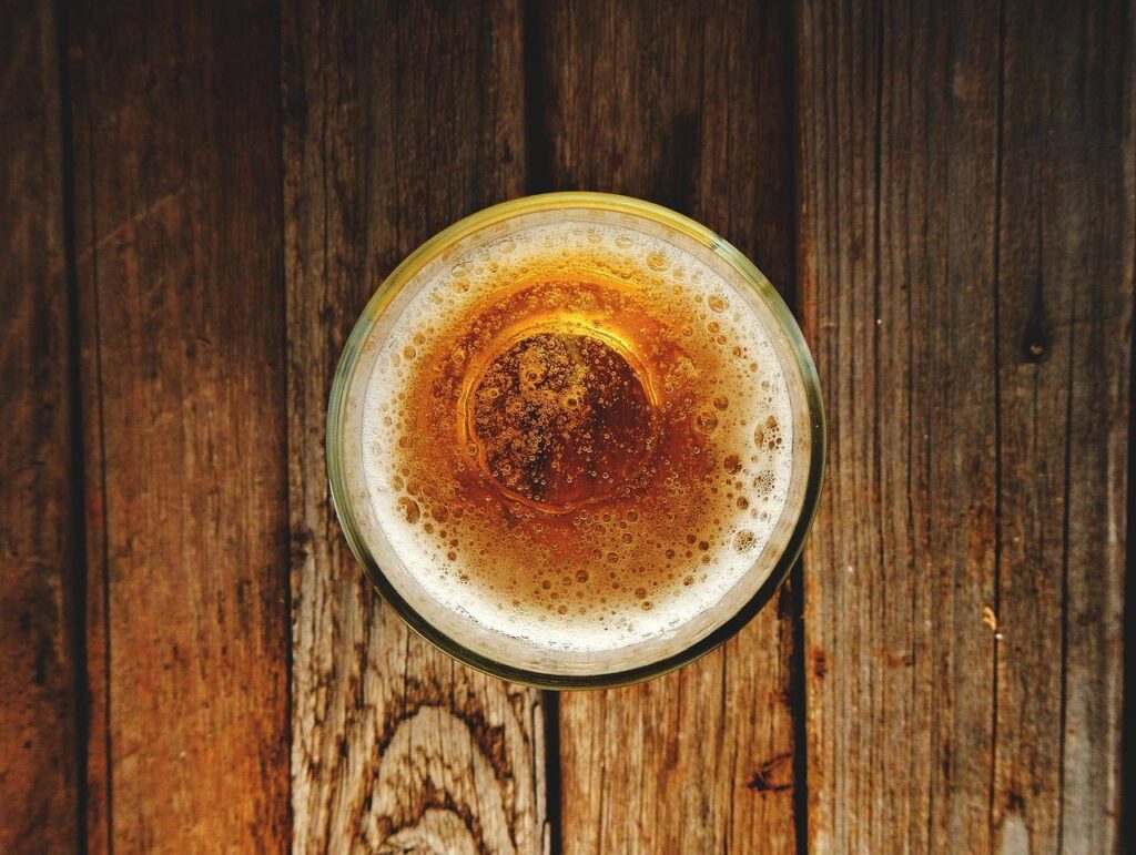 Glasses of beer on a bar, seen from above