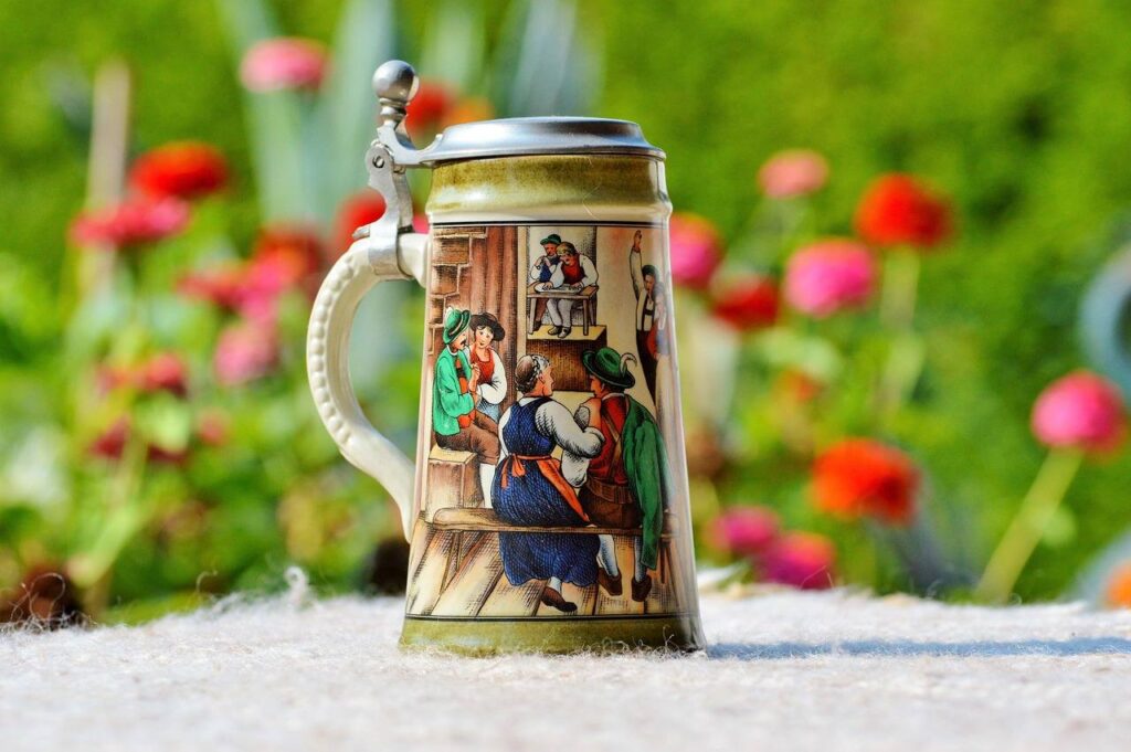 A painted stoneware beer stein