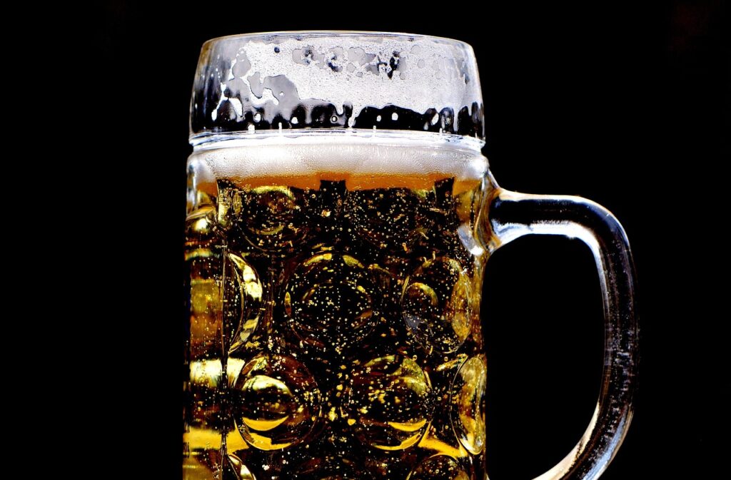 A full one-liter glass beer mug