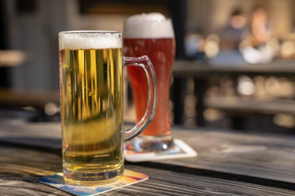 A glass of beer in a beer garden